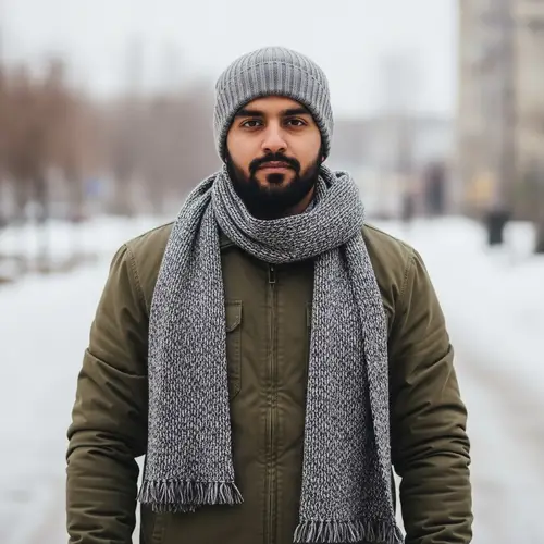 Strong South Asian Man Winter Attire Bust Portrait