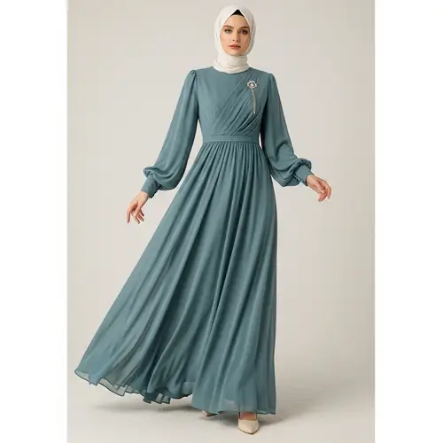 Elegant Blue-Green Chiffon Dress with Long Sleeves & Chest Accessory
