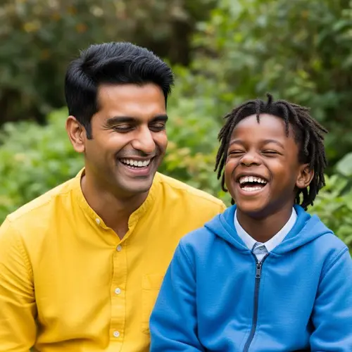 Joyful South Asian Man Laughing with Black Boy Outdoors