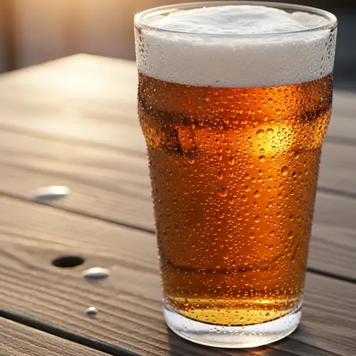 Refreshing Cold Amber Beer - Rustic Wooden Table View