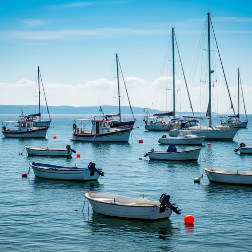 Tranquil Seafaring Scene with Various Boats | Ocean Serenity