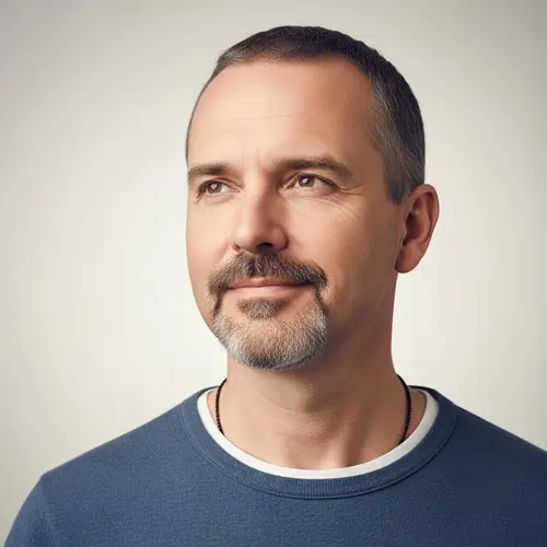 Confident Caucasian Man with Short Hair and Goatee