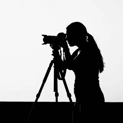 Silhouette Drawing of Hispanic Female Photographer Taking Picture