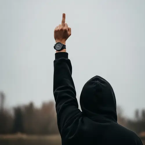 Gesture of Individual Raising Middle Finger