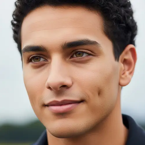 Young Man's Face - Calm Expression with Hazel Eyes