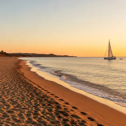 Tranquil Coastal Landscape with Sandy Beach and Sailboat