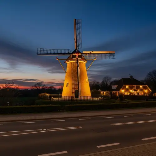 Traditional Windmill Illuminated at Dusk - Peaceful Scene