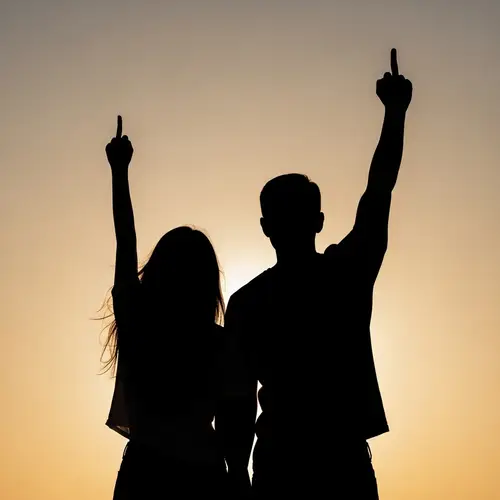 Silhouette Couple Showing Unity and Defiance