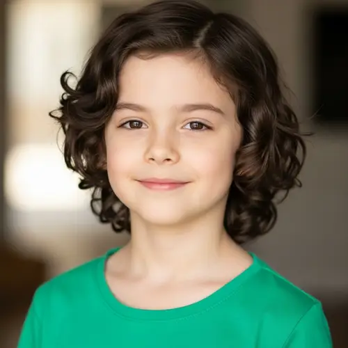 South Korean Boy with Curly Hair in Green Shirt