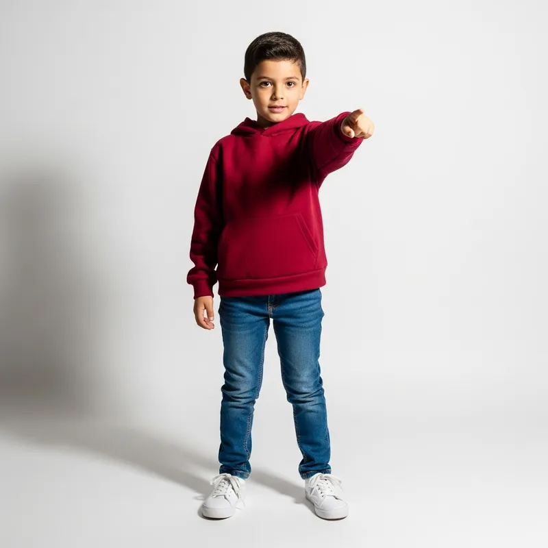 Young Hispanic Boy in Red Hoodie and Blue Jeans