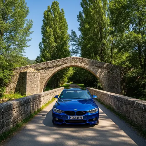 Sleek BMW Car on Tranquil Stone Bridge