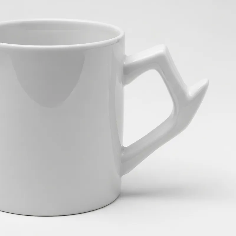 White Ceramic Mug with Distinctive Handle Design White Ceramic Mug with Distinctive Handle Design