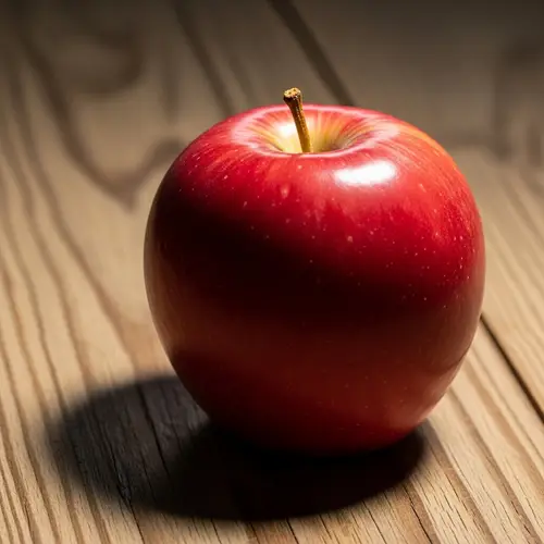 Realistic Apple on Table with Light Illumination