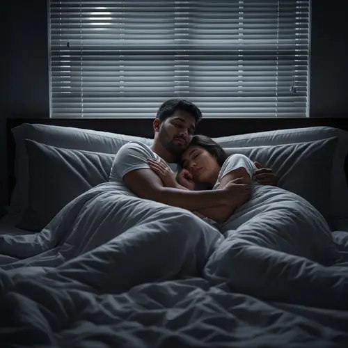 Romantic Scene of South Asian Male and Hispanic Female Cuddling in Bed