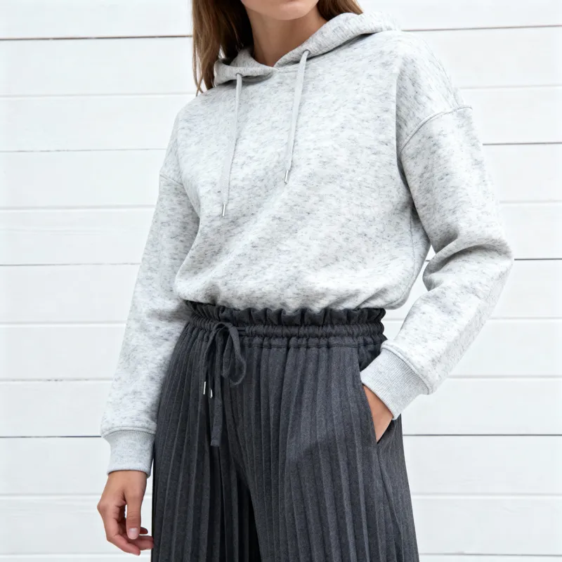 Stylish Woman in Grey Hoodie - Scandinavian Charm