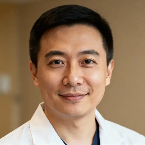 Trustworthy Doctor Headshot in White Coat