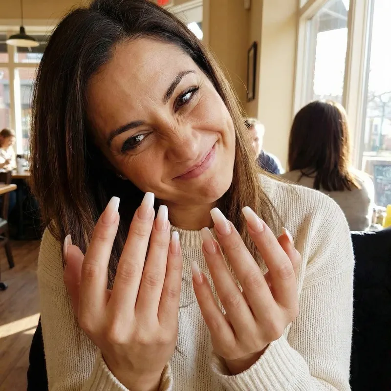 Sassy Woman Flaunting Stunning Ombre Coffin Nails