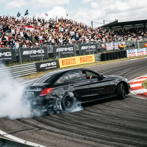 Black Mercedes-Benz C63 AMG Drifting Action Shot