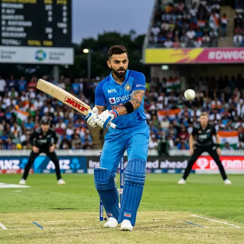 Accomplished Cricket Athlete in Blue Attire | Number 18