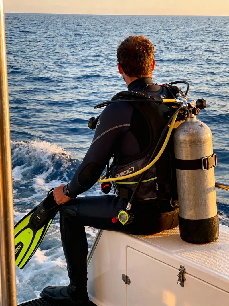 Ready for Adventure: Scuba Diver Boat Dive Prep