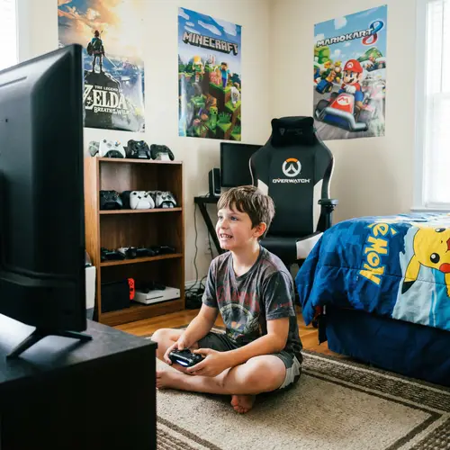 Young Gaming Enthusiast Immersed in Video Game Experience
