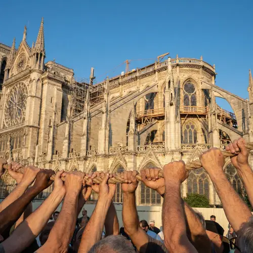 Unity and Dedication in Colossal Cathedral Construction