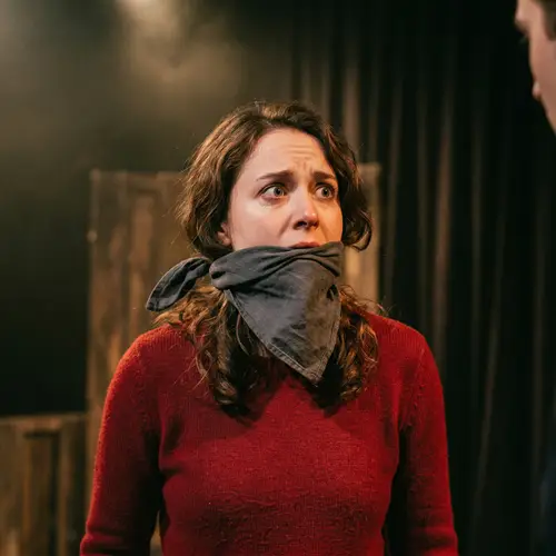 Dramatic Stage Performance by Expressive Actress