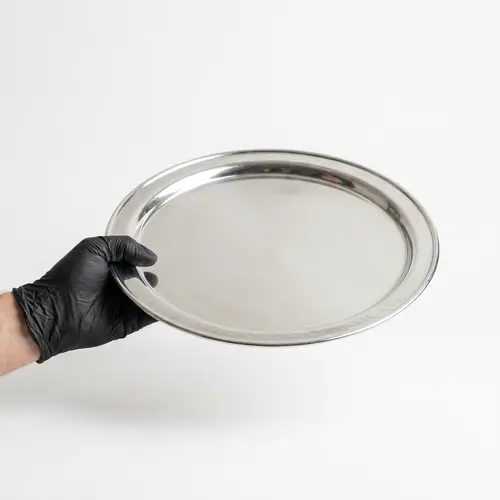 Elegant Silver Serving Tray with Nitrile Gloved Hand