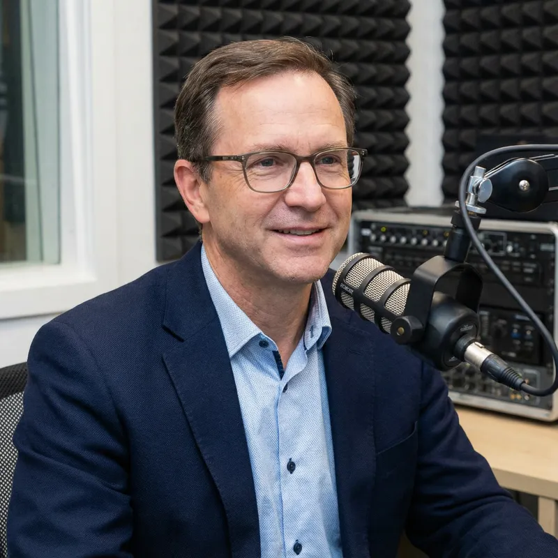 Professional Podcast Host Portrait in a Recording Studio