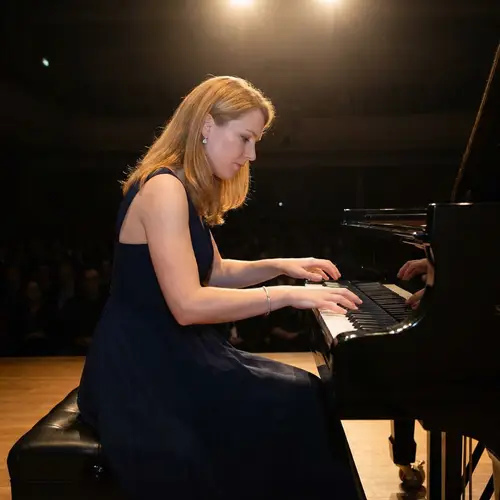 Olivia Altair Pianist Performing in Stylish Formal Gown