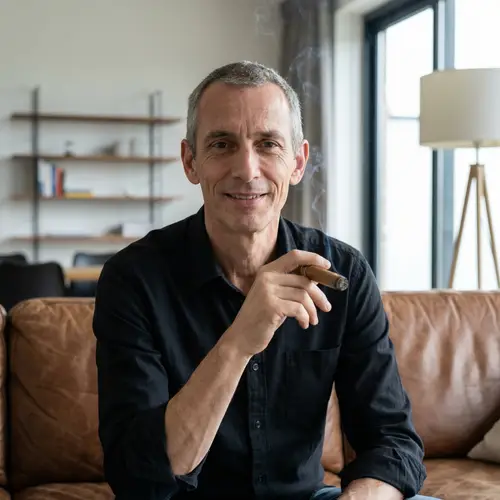Middle-Aged Man with Gray Hair and Cigar | Modern Interior Setting