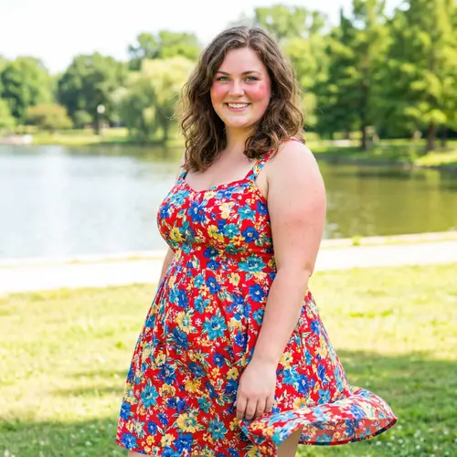 Confident Plus-sized Girl in Floral Sundress | Serene Park Scene