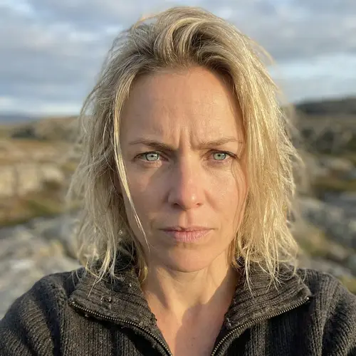 Intense Blue Eyes: Portrait of a Determined Caucasian Woman