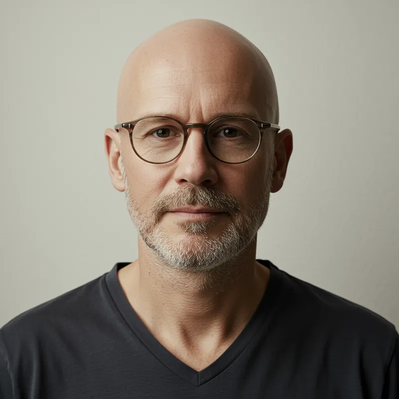 45-Year-Old Man Wearing Glasses and Bald 45-Year-Old Man Wearing Glasses and Bald