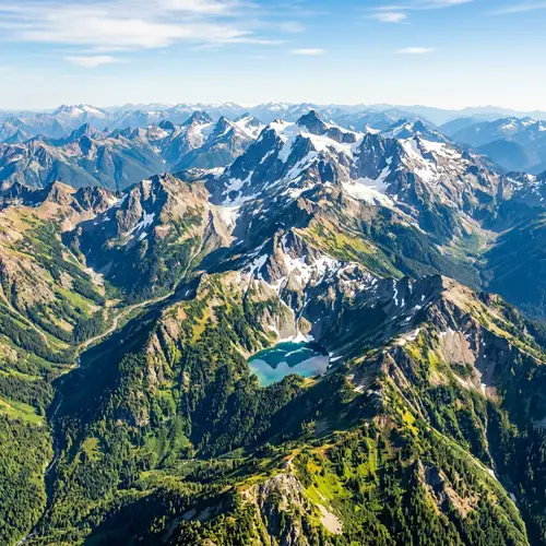 Vibrant Mountain Range: Aerial Panorama of Wilderness Beauty