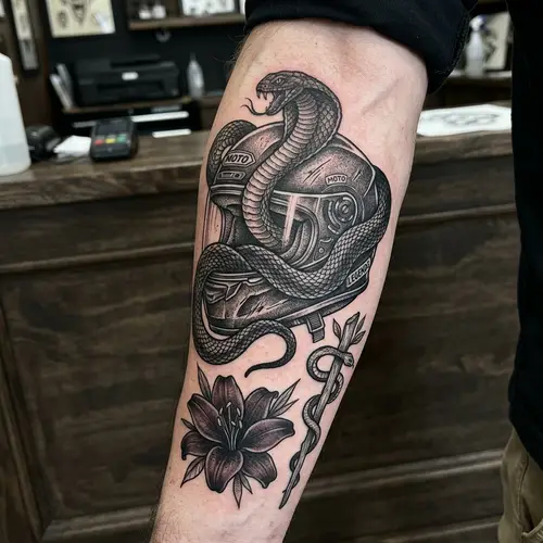 Unique Tattoo: Motorcycle Helmet & Snake Design