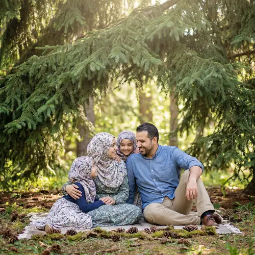 Happy Family Photo Under Spruce Tree | Cultural Tradition Showcase