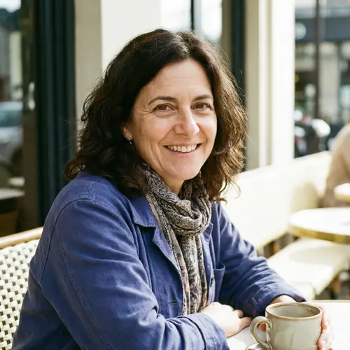 Beautiful Woman in Her 50s with Dark Brown Hair and Brown Eyes