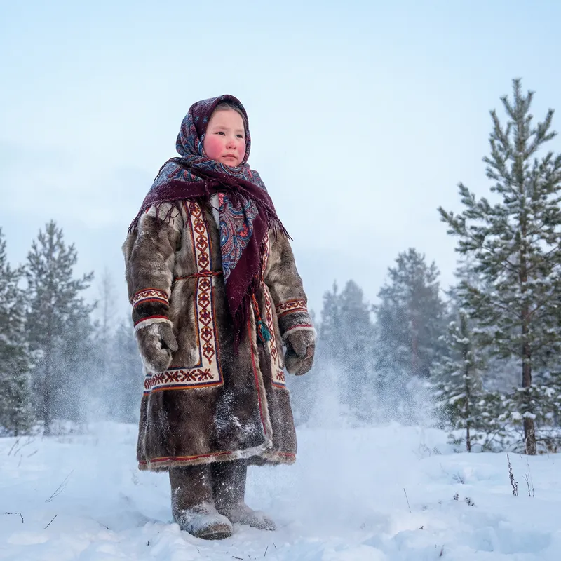 Brave Siberian Girl in Traditional Attire | Snowy Landscape