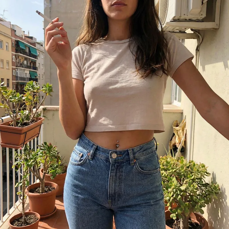 Stylish Woman with Belly Button Ring and Cigarette