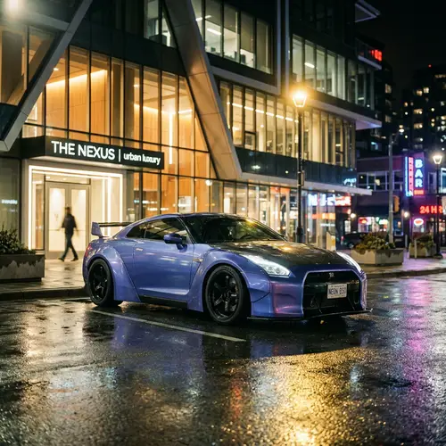Sleek Metallic Blue Sports Car in Urban Setting at Night