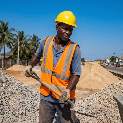 Black Male Construction Worker Building Road in Nigeria