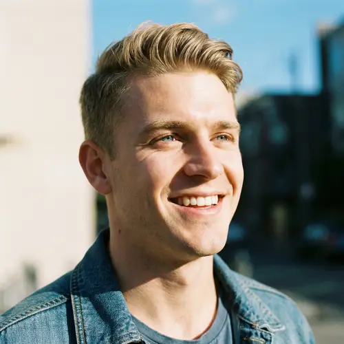 Polished Blonde Male Portrait with Energetic Vibe