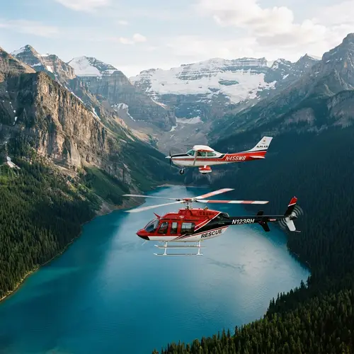 Red, White & Black Plane and Helicopter Flying Over Mountain-Lake View