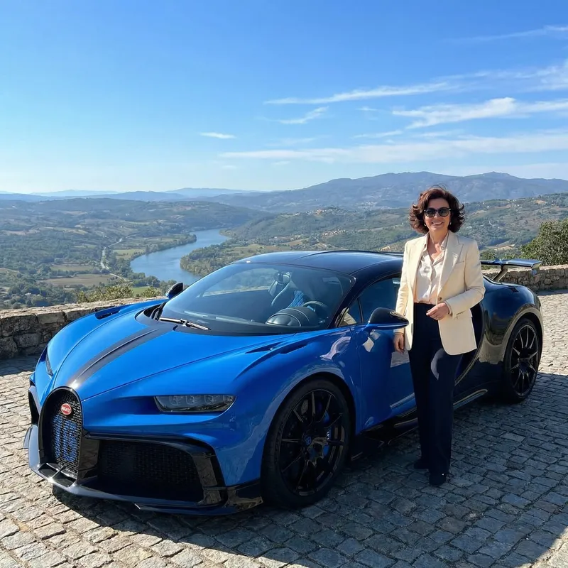 Luxurious Bugatti with Beautiful Lady in Scenic Setting Luxurious Bugatti with Beautiful Lady in Scenic Setting