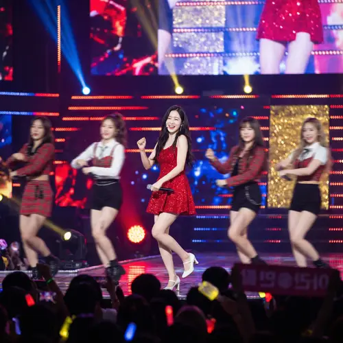 K-pop Idol in Red Dress Singing and Dancing on Stage