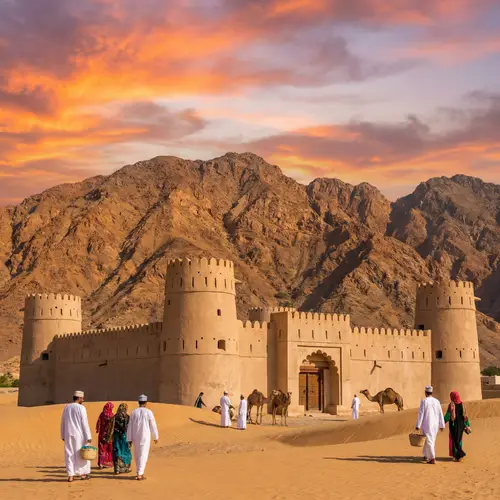 Vibrant Middle Eastern Landscape in Oman | Sunset over Mountains and Sand Dunes