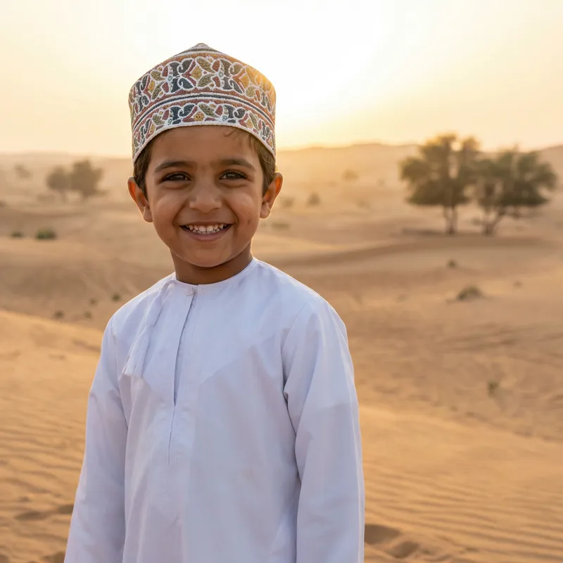 Radiant Joy: Young Omani Child in Traditional Attire
