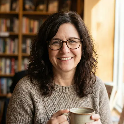 Elegant Woman in Her 50s with Brown Hair and Glasses