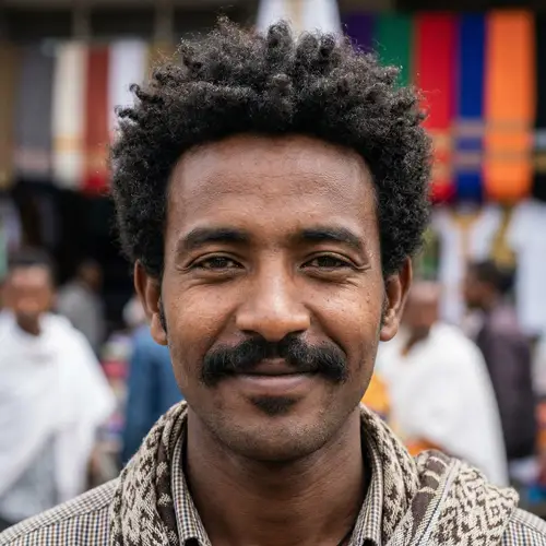 Ethiopian Man with Oval Face and Thick Mustache | Dignified Appearance